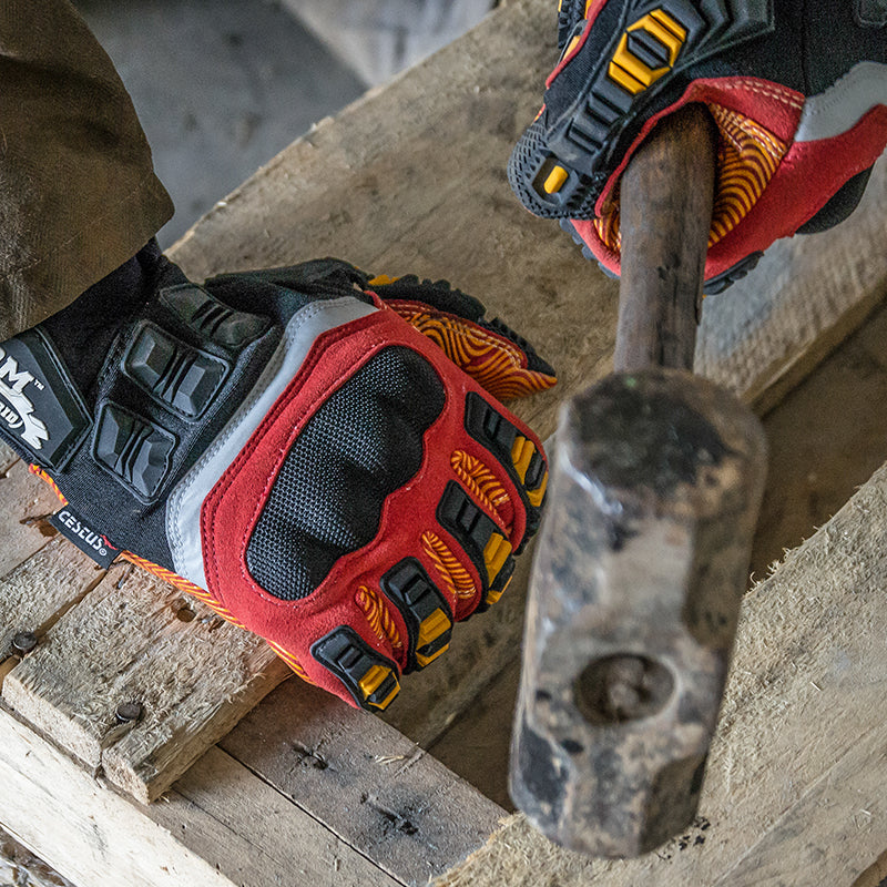 cestus impact resistant work gloves with man holding a hammer